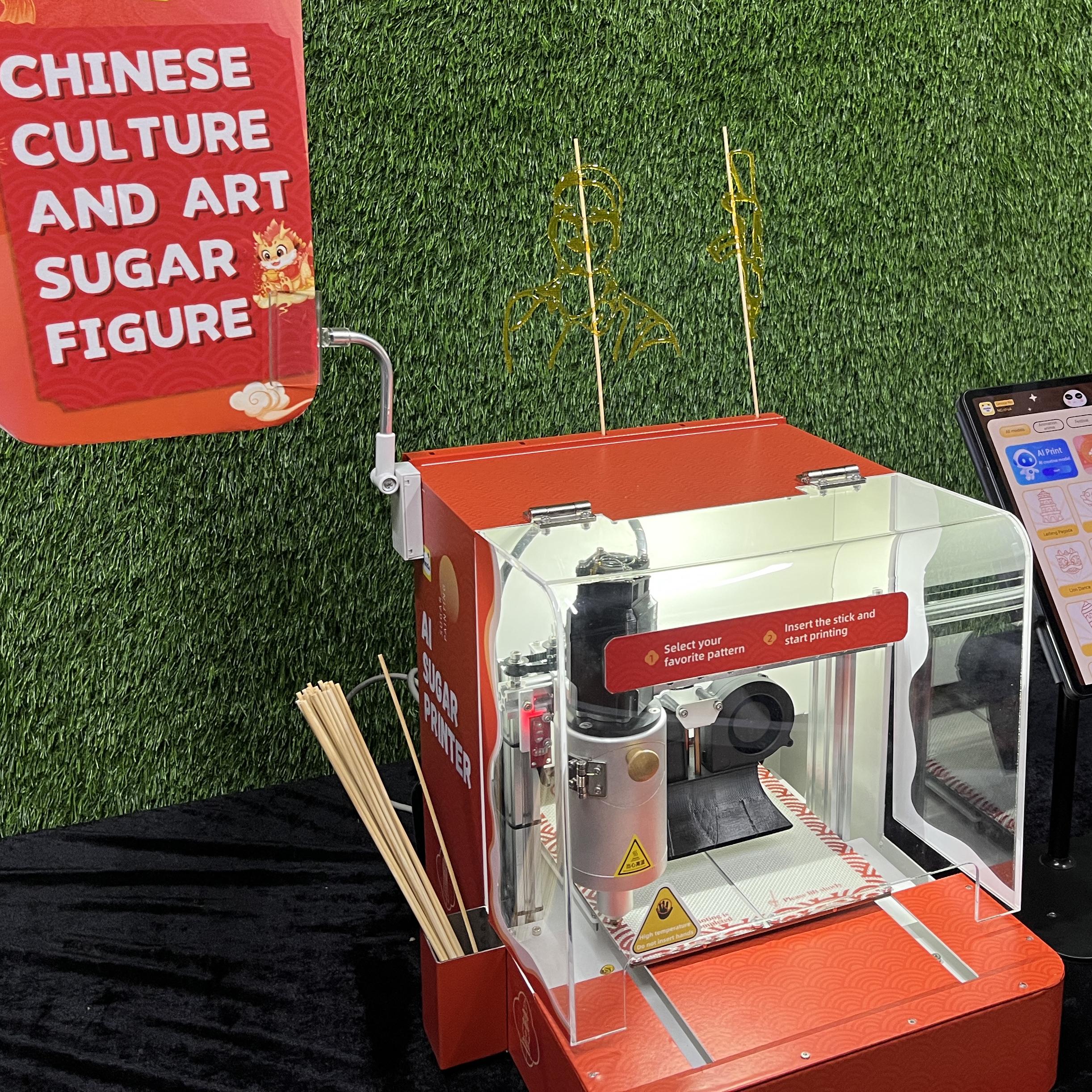 Guests using the AI Sugar Painting Robot in UAE, watching it create edible art and enjoying unique designs at events, kids activities, and parties.